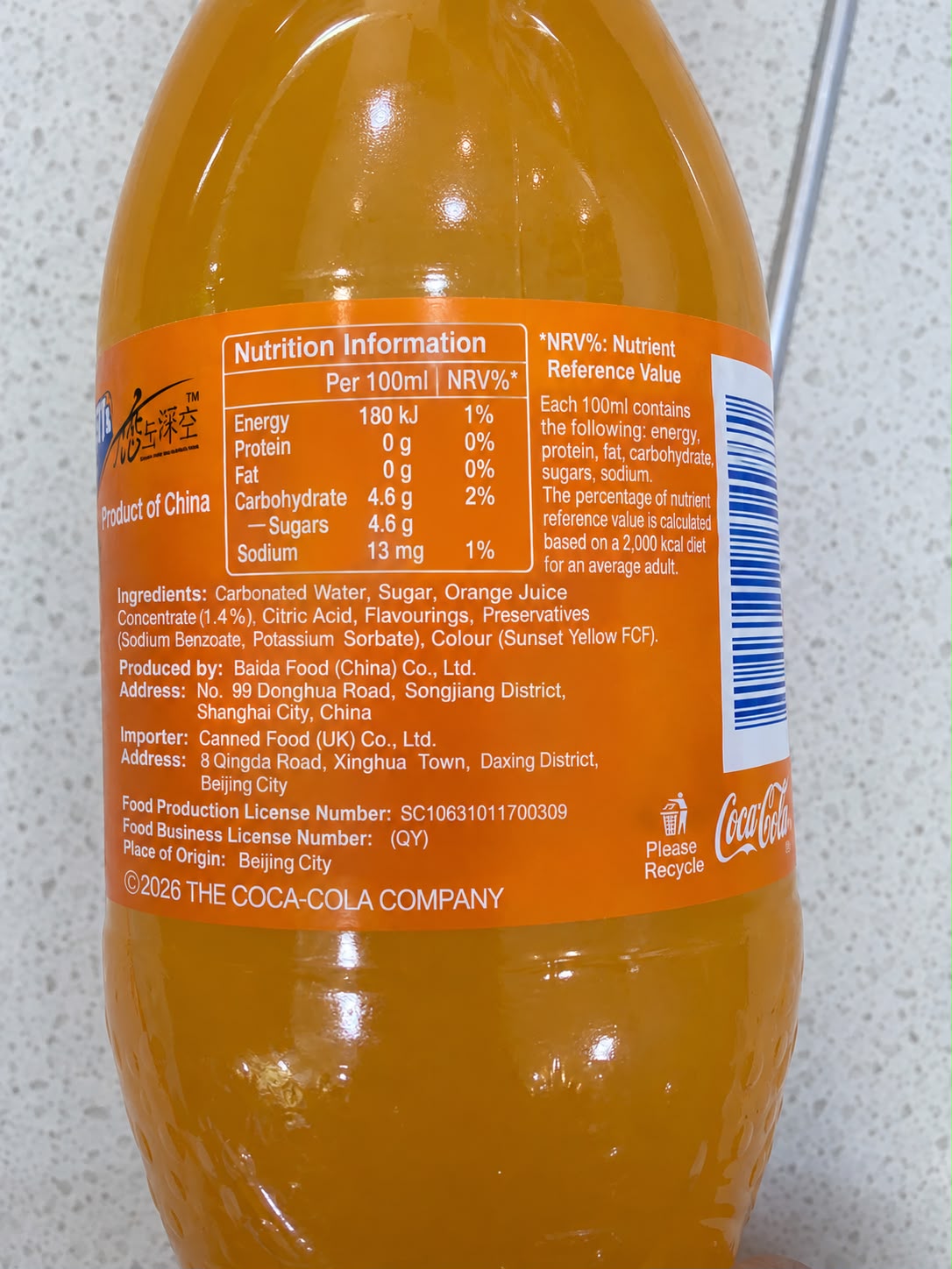 Fanta orange drink bottle showing ingredients and nutrition information | Asian Grocery UK