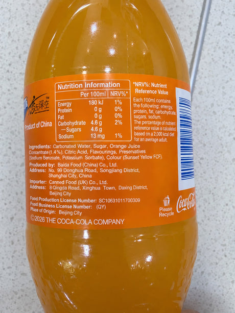 Fanta orange drink bottle showing ingredients and nutrition information | Asian Grocery UK