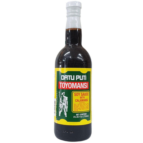 Datu Puti Toyomansi 750ml bottle, showcasing a vibrant label with a zesty lime and soy sauce blend from the Philippines.